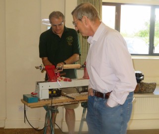 Paul giving Dave some assistance with a problem